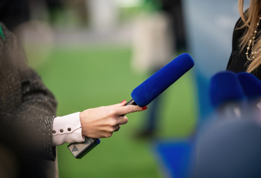 Skilled journalist delves into a captivating event interview.